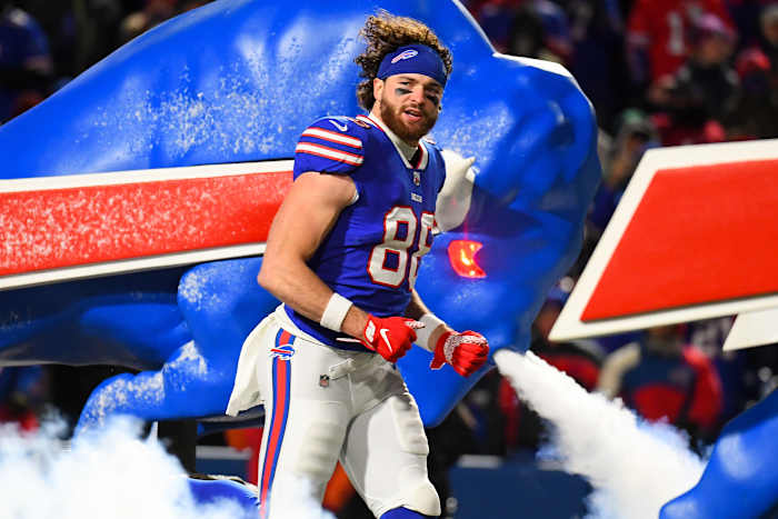 Buffalo Bills tight end Dawson Knox (88) jogs on the field during player introductions prior to the game against the New England Patriots at Highmark Stadium.